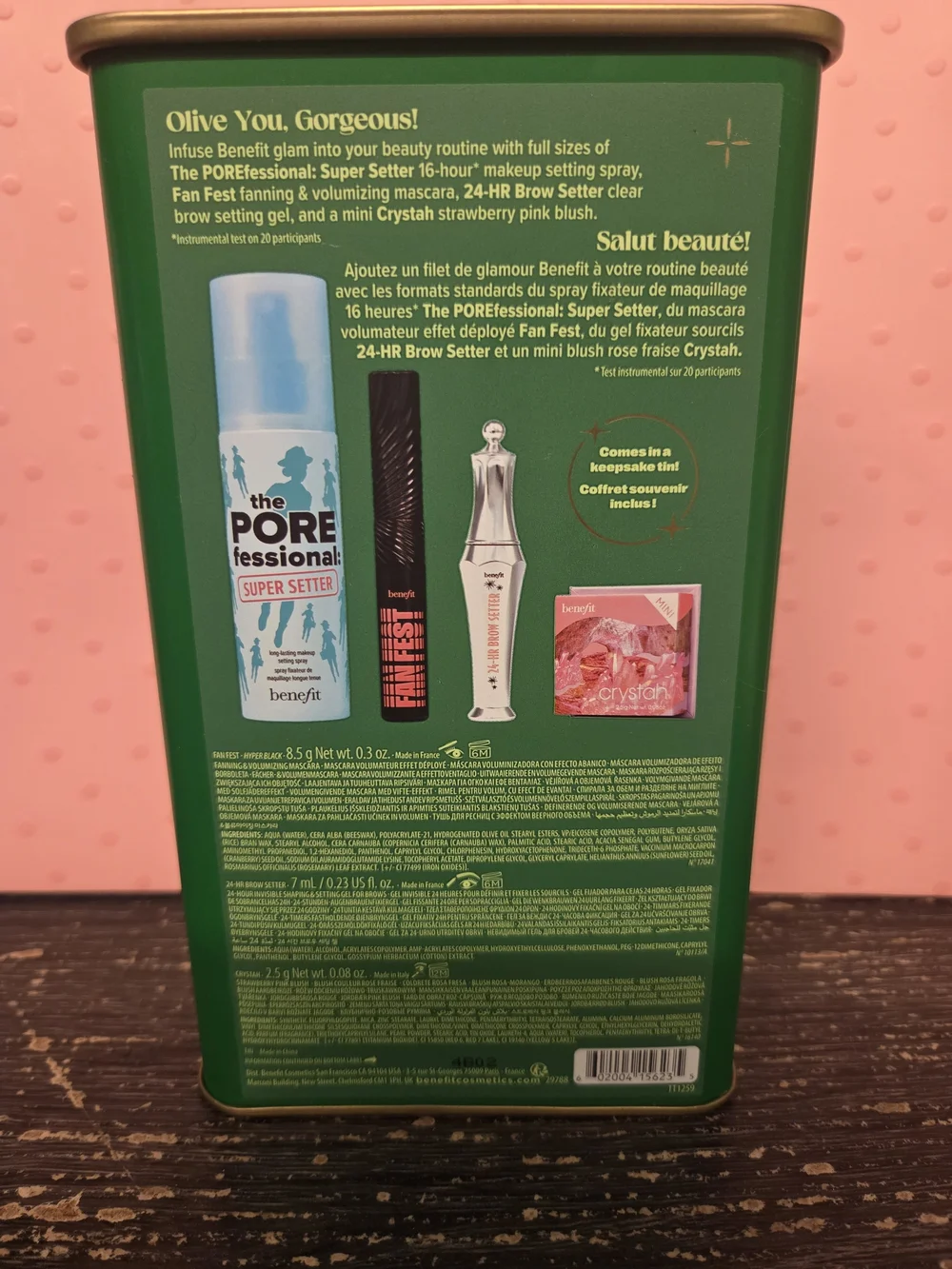 Benefit makeup collection with teal setting spray and green tin